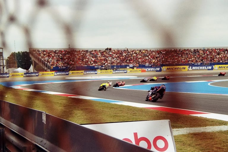 MotoGP riders on the track at TT Circuit Assen. Unedited 35mm film SOOC photography.
