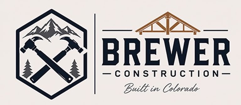 Brewer Construction logo with crossed hammers, mountains, and Built in Colorado tagline for Denver area contracting.
