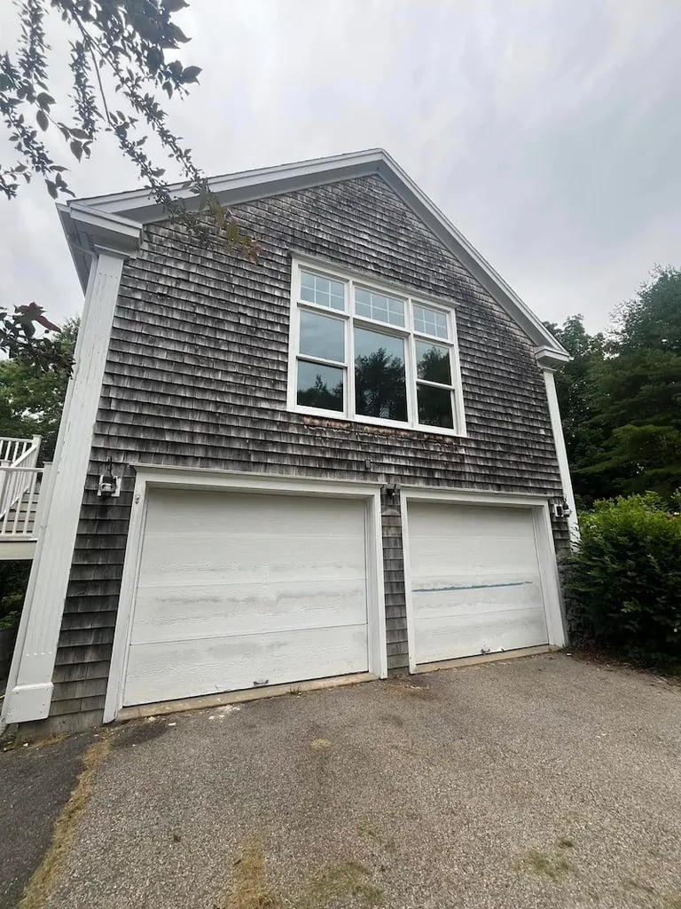 Professional pressure washing services in Dover, NH for sidewalks, patios, and decks after buildup