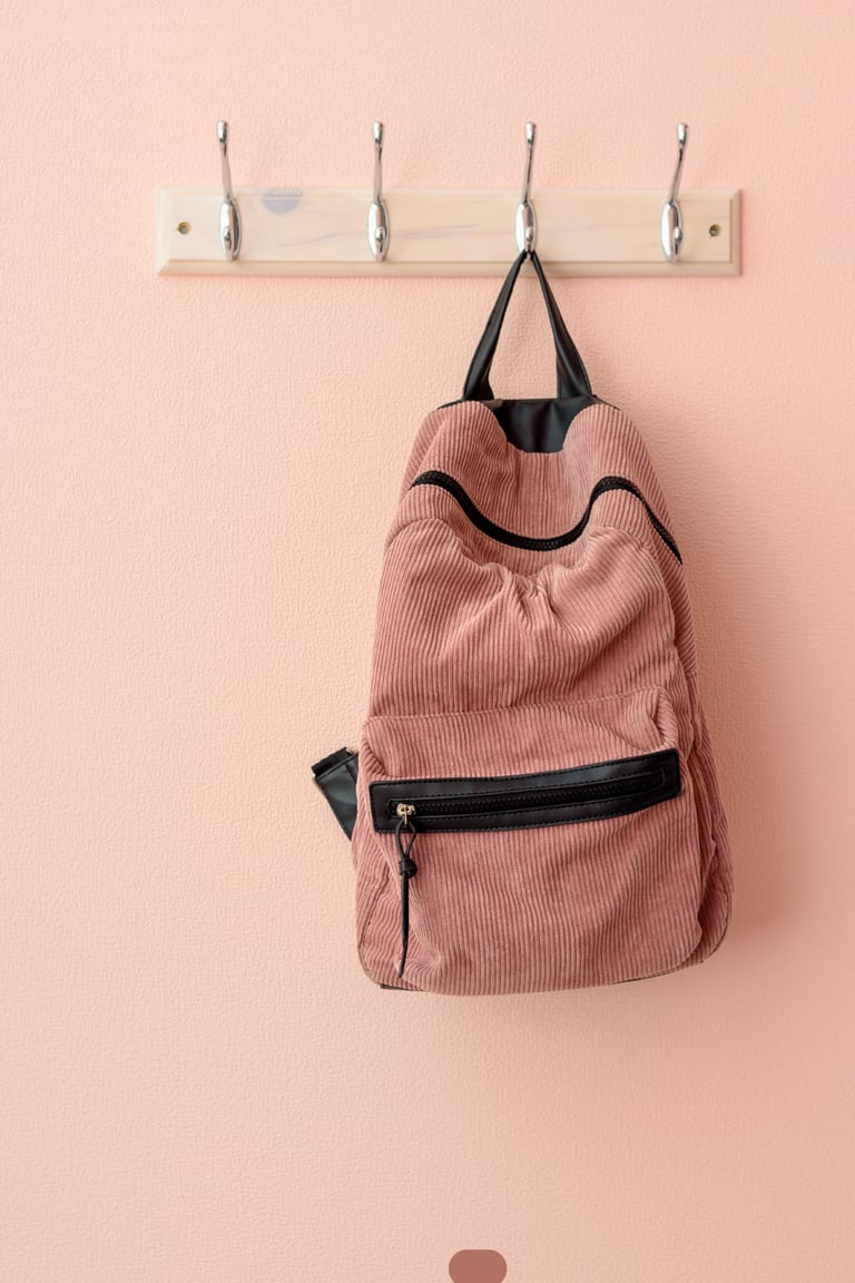 DIY mudroom drop zone with hooks and baskets for back-to-school organization