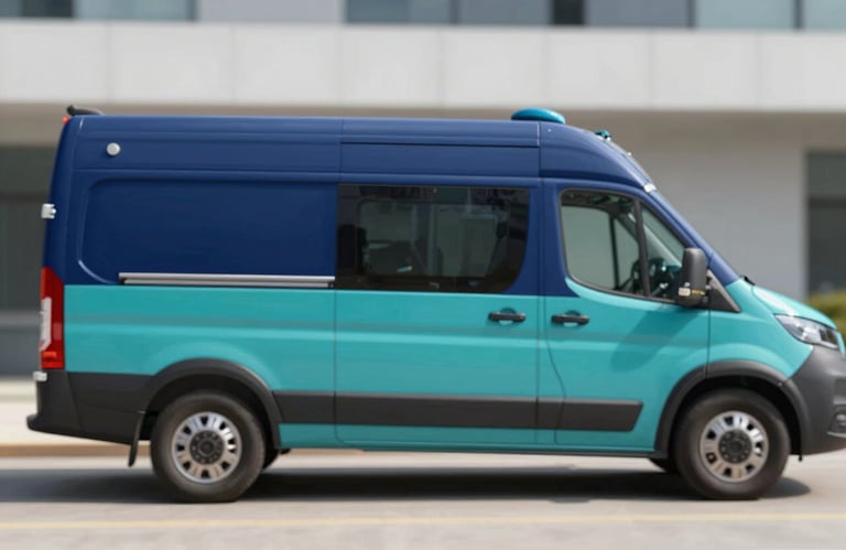 A modern, clean mobile lab vehicle with minimalist branding parked in a professional setting. The colors used on the vehicle are navy #0E2A47 and teal #376E78. The lighting is bright and clear, emphasizing professionalism.