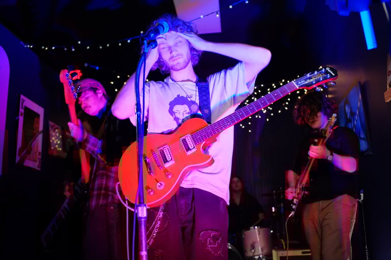 Event photography in Montgomery AL – Carmine Sun at Village Green Records, live concert photo by Spirit World Photo