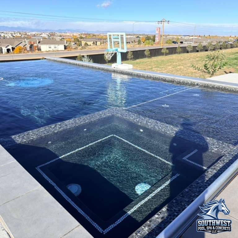 Luxury backyard pool installation in Aurora Colorado