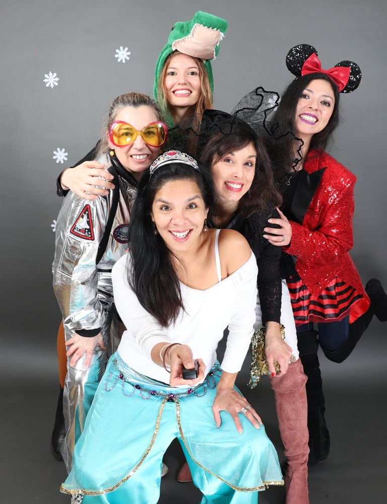 a group of people dressed in costumes for a photo