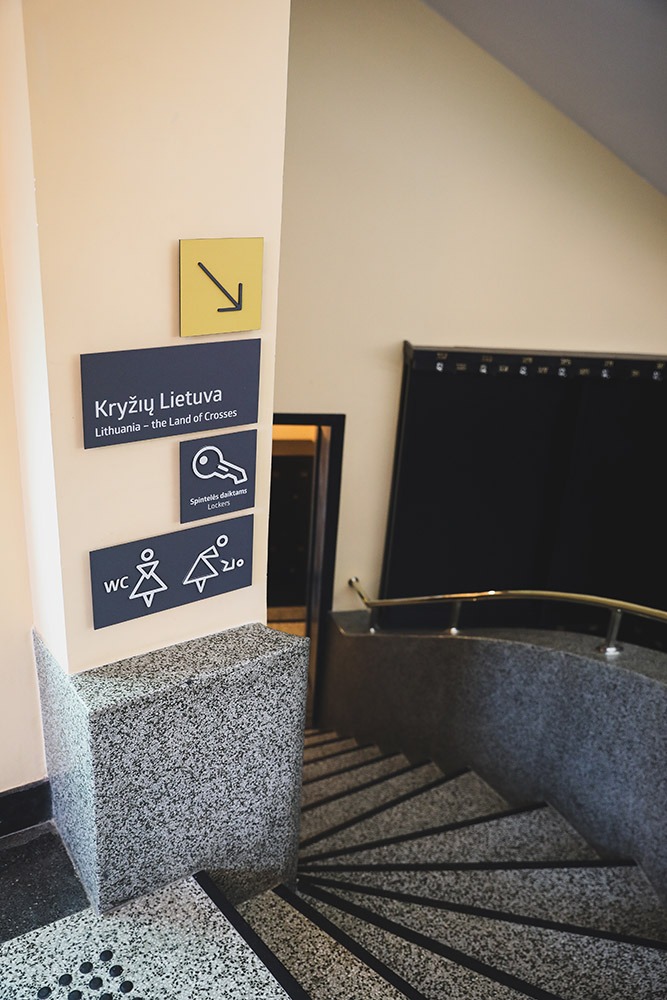 Museum signage and stairs marking.