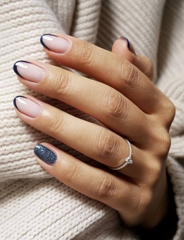 Blue ombre nails fading from nude to aqua with rhinestone accents – dreamy fall-to-winter transition