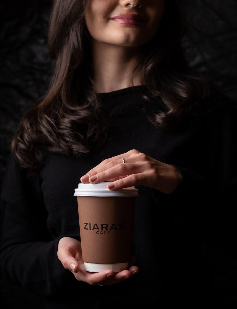 woman holding a cup of coffee