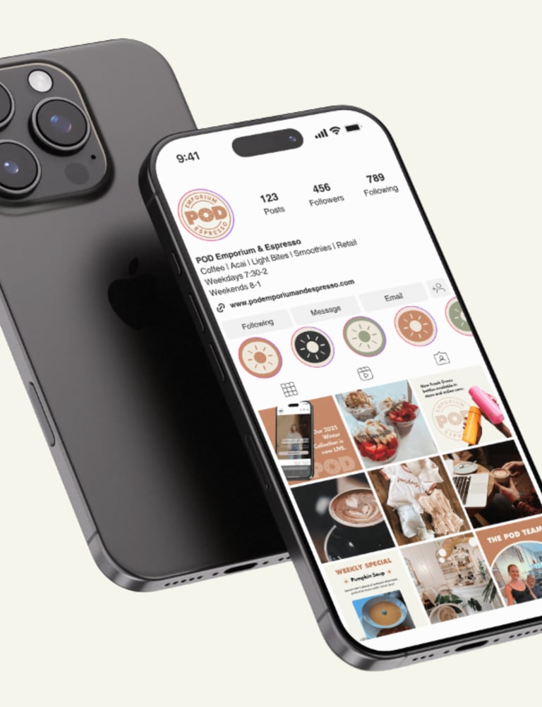 Two black iPhone 14 Pro smartphones displaying an Instagram profile for POD emporium and espresso.