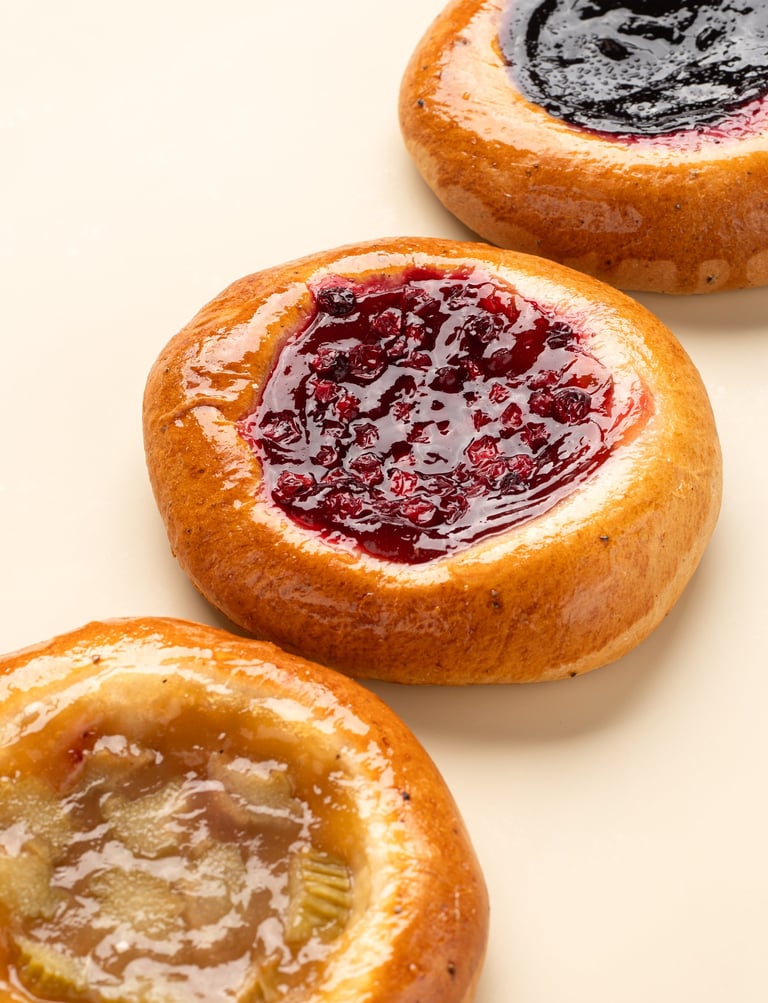 buns with a shiny berry surface