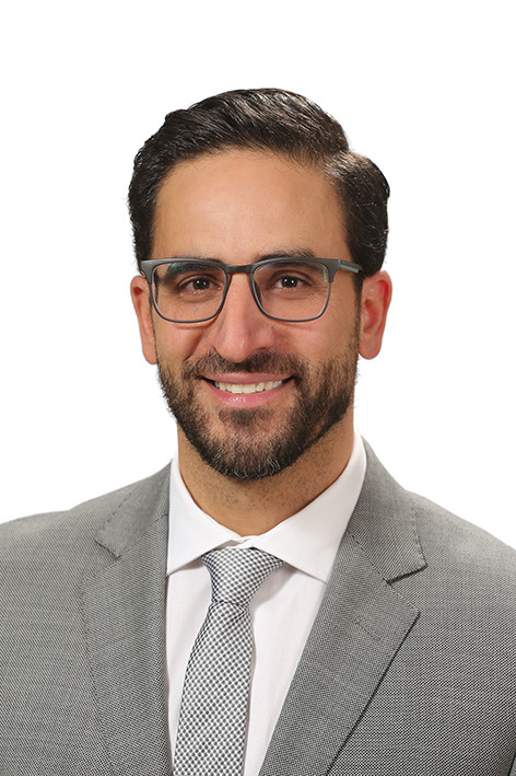 A portrait of trainer Ahmad Al-Assad