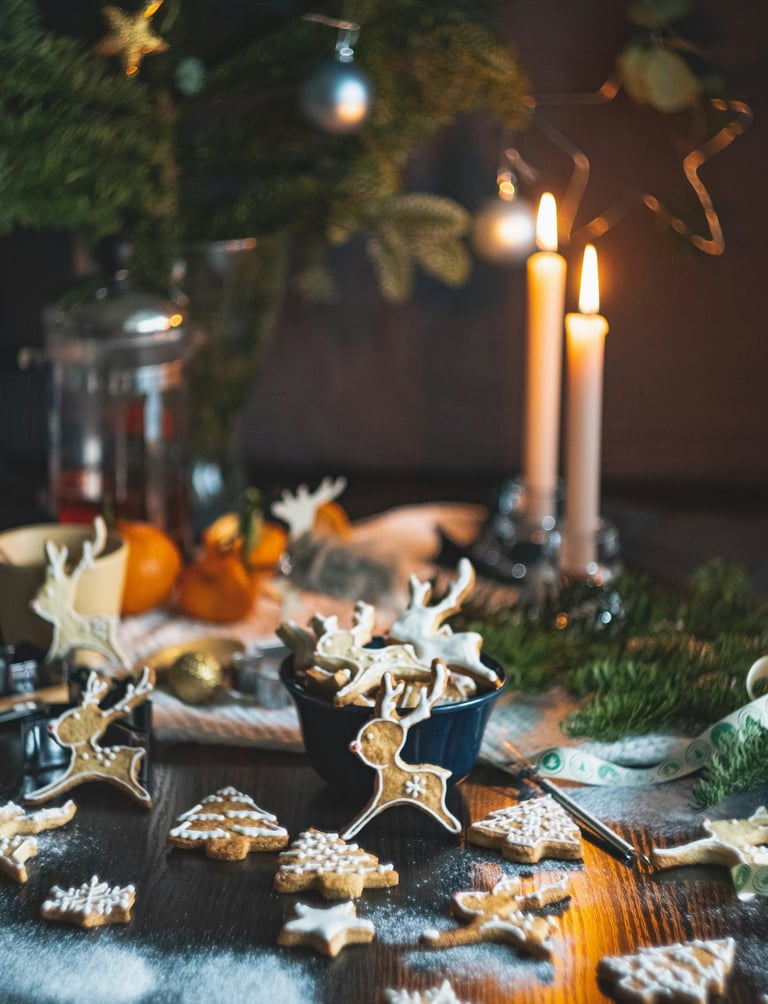 a table with cookies and candles on it