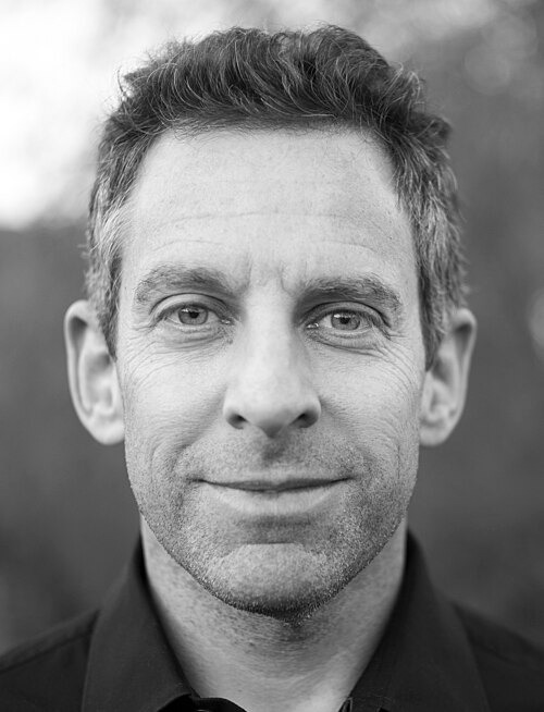 Sam Harris with a tie on a black and white photo