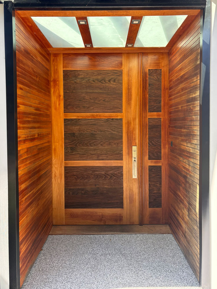 Before image of stain refinishing on Nanoose Bay entrance way