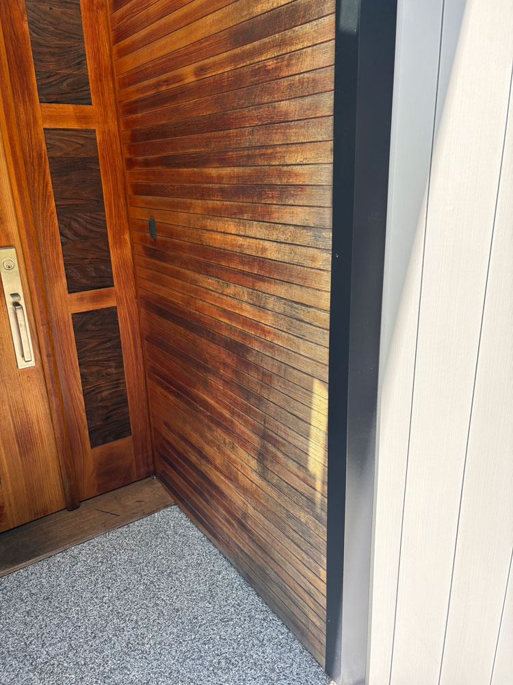 before image of stain refinishing on Nanoose Bay entrance way