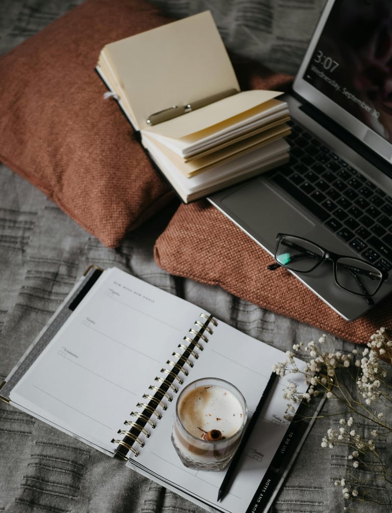“Calm workspace with warm light, notebook, and coffee symbolizing a gentle approach to online income