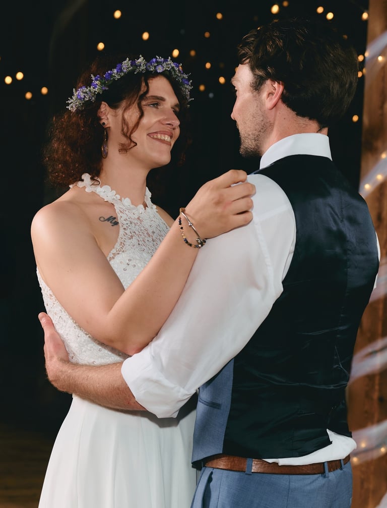 a bride and groom dancing at their wedding reception