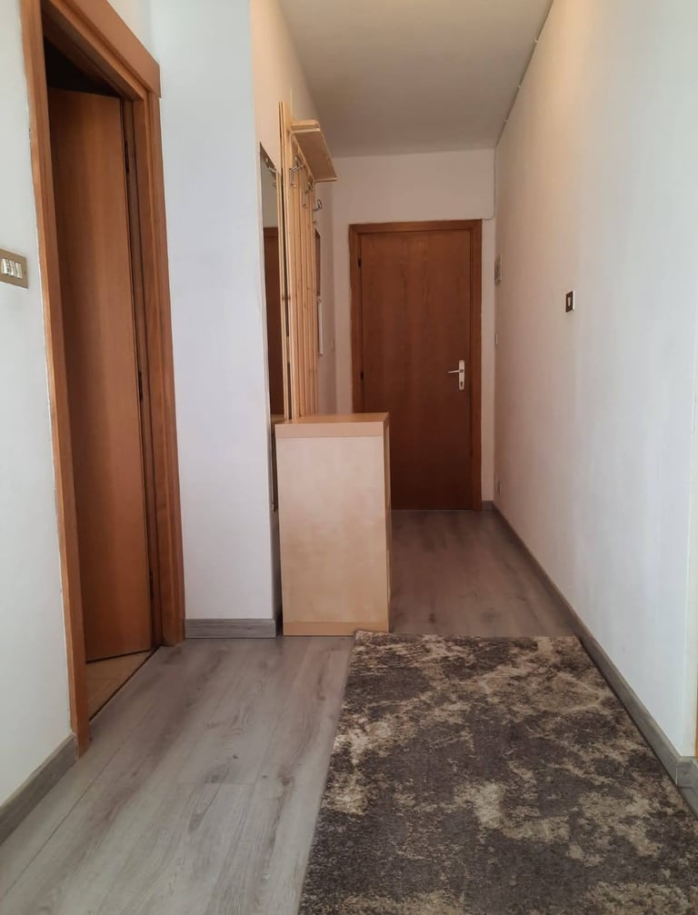 alt="ingresso appartamento affitto val di Fassa"