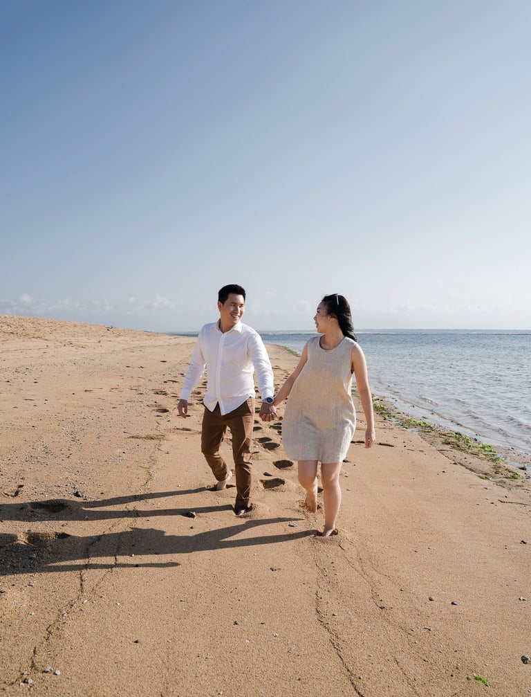 Intimate proposal couple walking on the beach at Sofitel Nusa Dua Bali