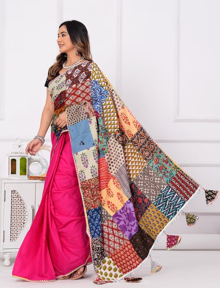 Lightweight mulmul saree featuring premium designer patch work detailing