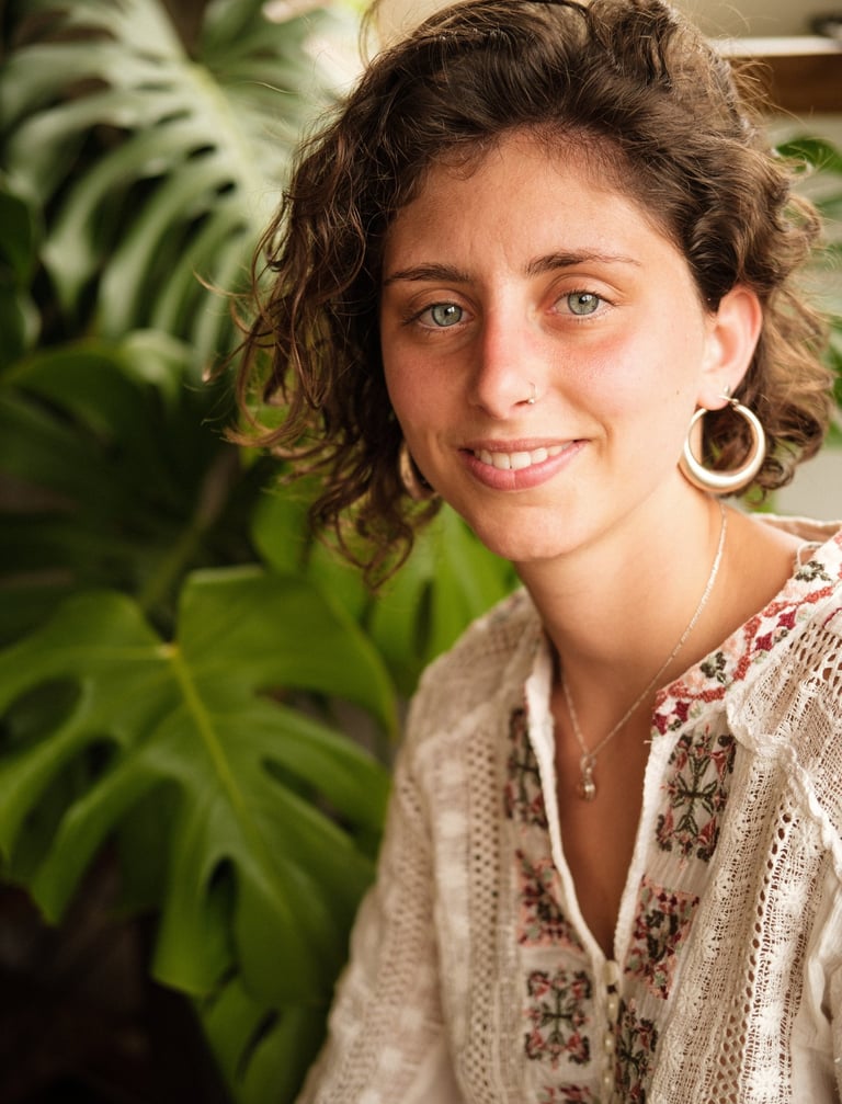 a woman with a large earring