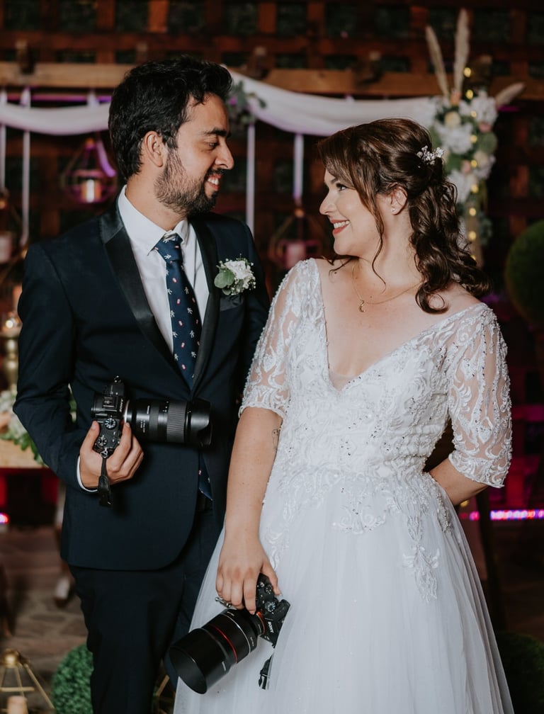 a man and woman standing in front of a wedding ceremony