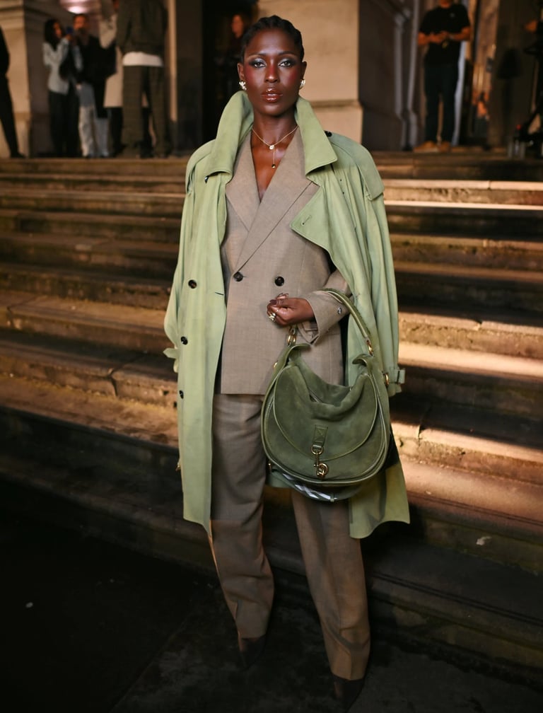 Jodie Turner-Smith in a green trench coat at London Fashion Week 2026.