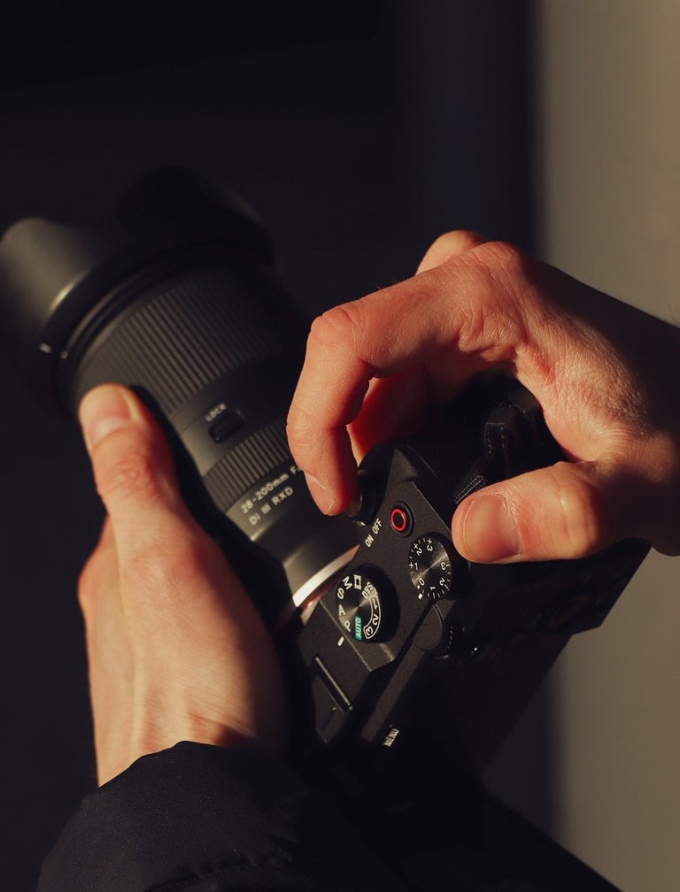 a person holding a camera and taking a picture