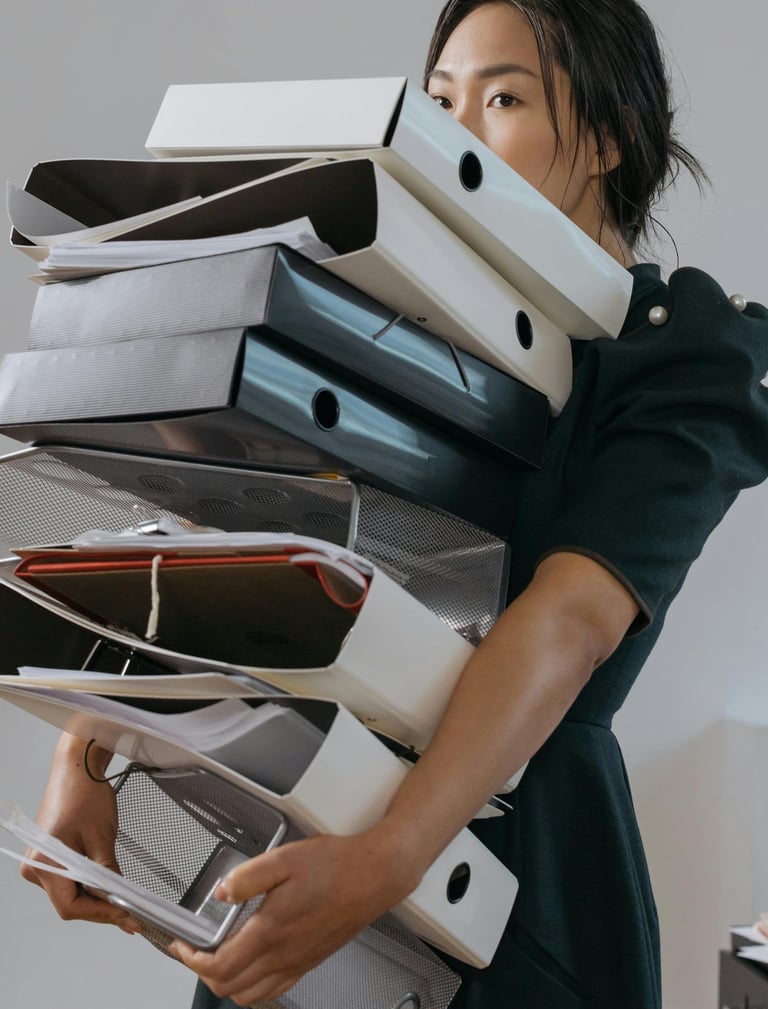 a woman in a green dress, Scientific Editor, holding a stack of scientific papers