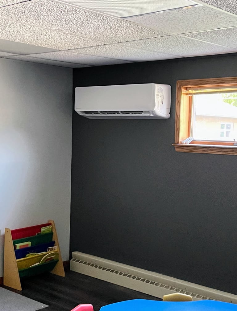 Mini Split Heat Pump installed in West Bend helps bring heat and AC to a hot classroom.