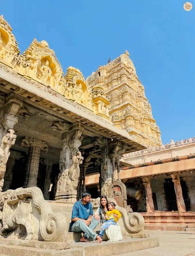 Family cherishing moments together at Virupaksha Temple in Hampi.