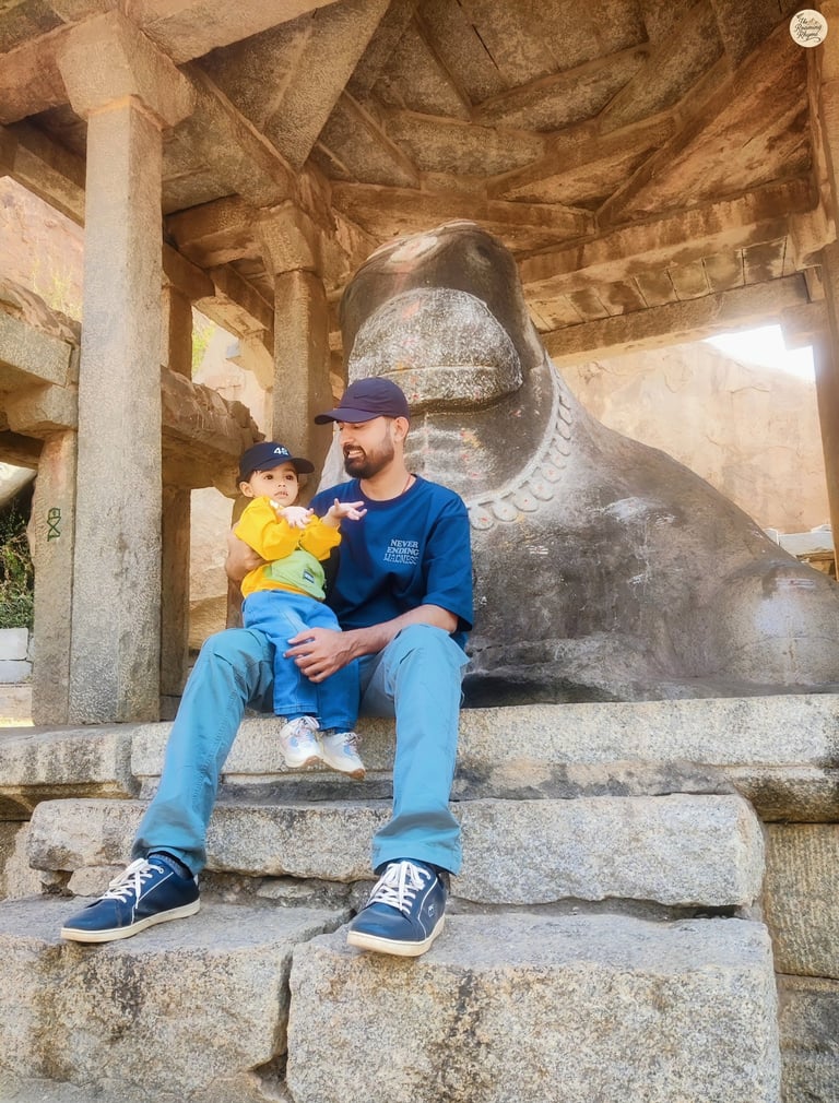 With my little one at Big Nandi - Hampi's guardian watching over us.