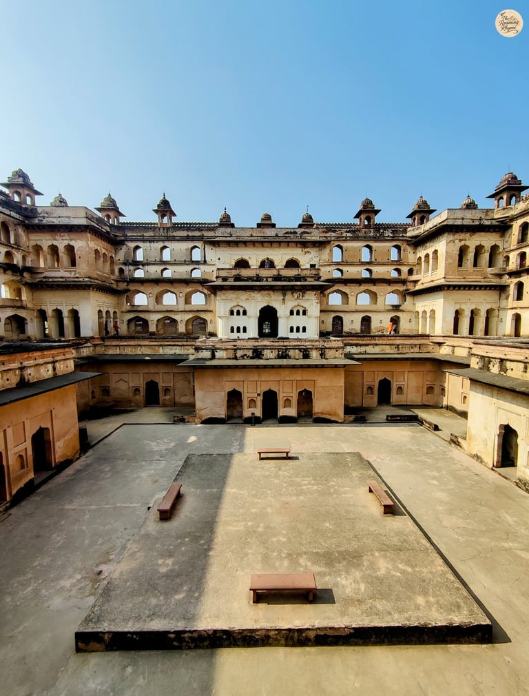 Architectural splendor of Raja Mahal, Orchha - captured in its full form and royal beauty.