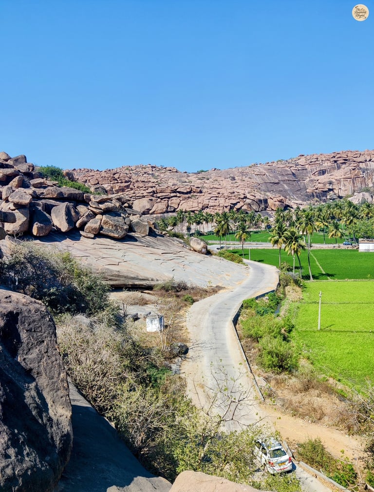 Kishkindha’s charm in Hampi—where boulders meet greenery in a mythical embrace.