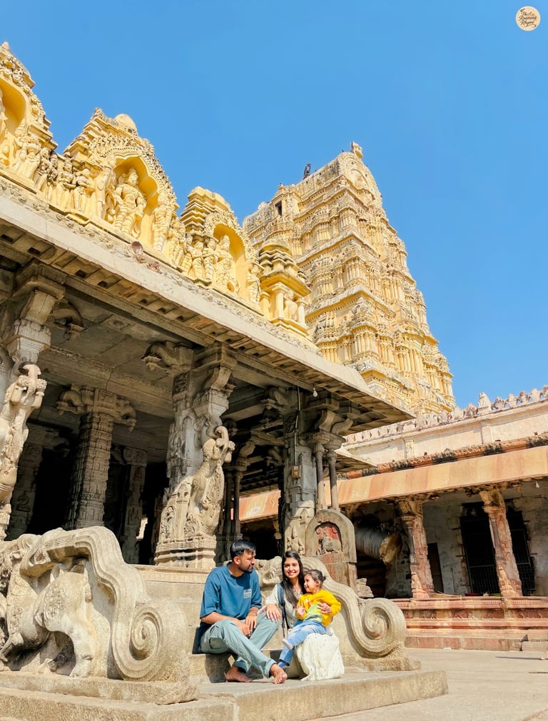 At Virupaksha Temple—cherishing family moments in the heart of Hampi.