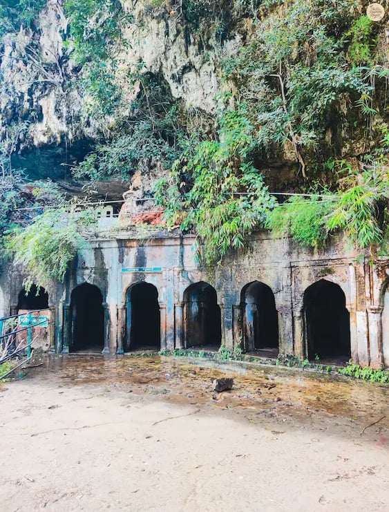Five natural caves hidden in the forest cliffs at Pandav Falls, Panna Tiger Reserve, Madhya Pradesh.