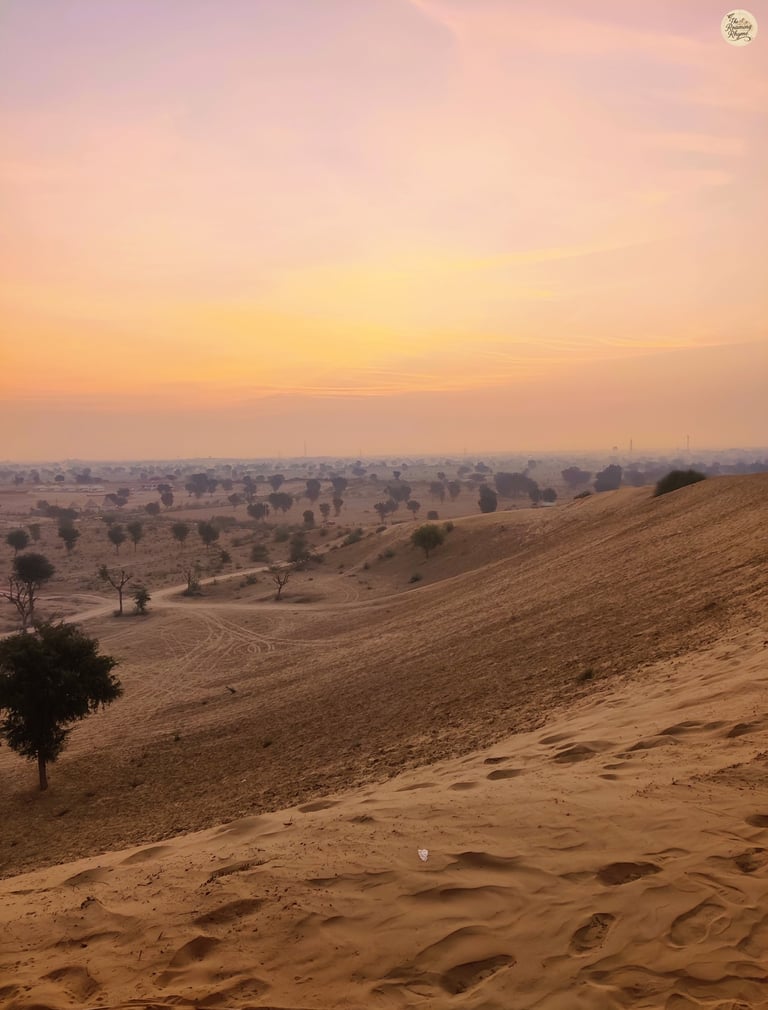 Sunset whispers over Raisar dunes - Bikaner's charming twilight tunes.