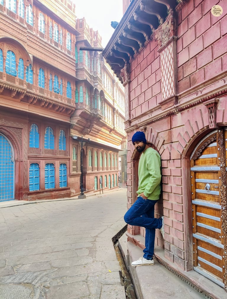 Narrow alley lined with grand havelis in the old city of Bikaner.