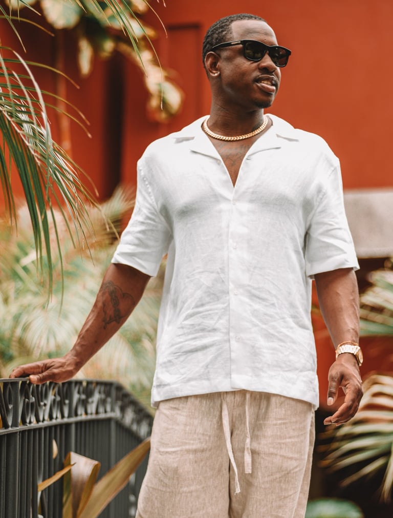 portrait of a man in a white shirt and sunglasses in Marriot Hotel in Herradura Costa Rica