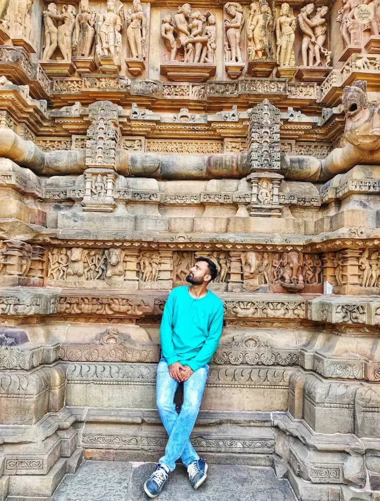 Close-up of intricate carvings on the outer wall of Lakshmana Temple, Khajuraho, Madhya Pradesh.
