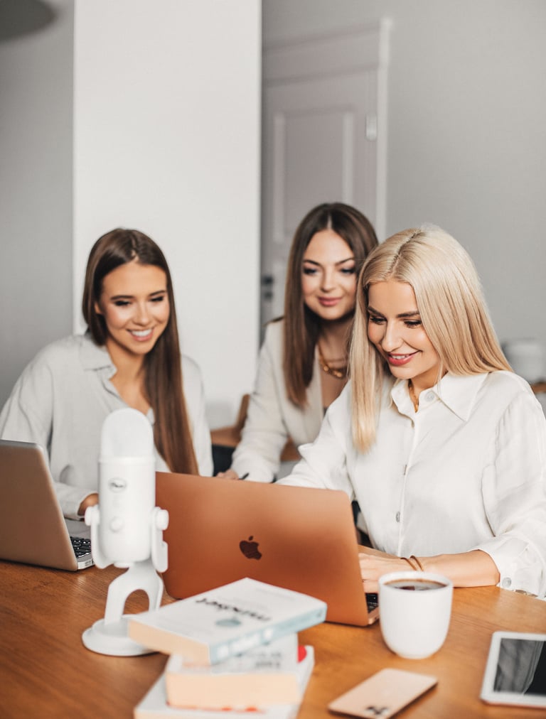 women using a laptop computer to contact medaesthetics laser and wellness