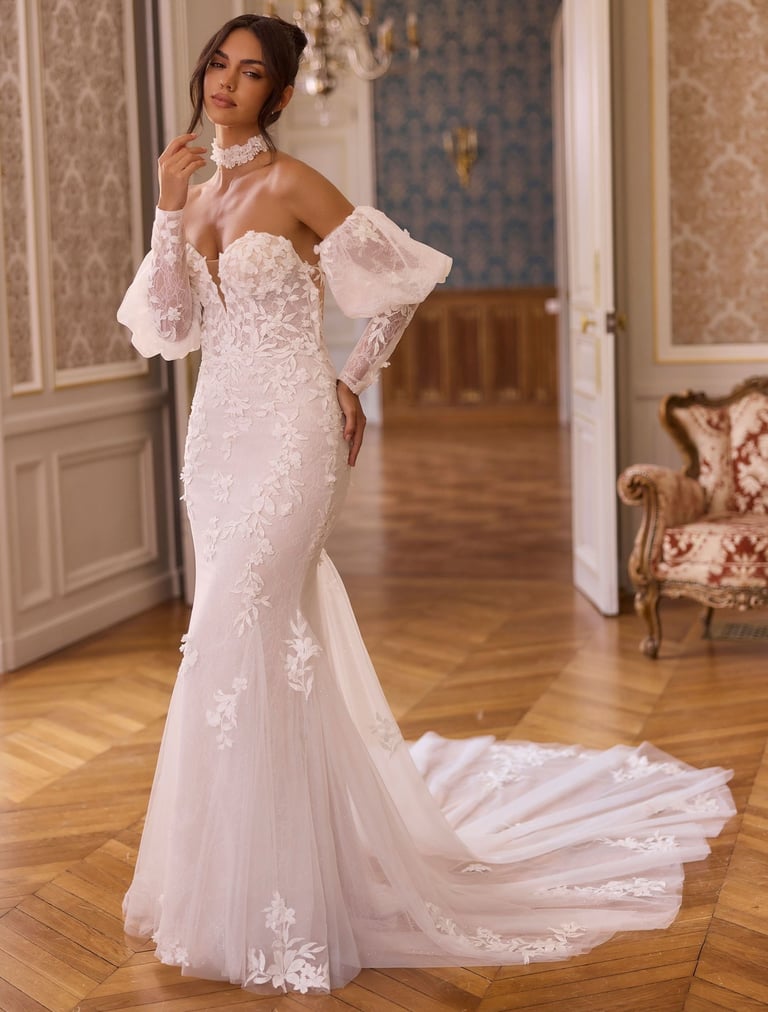 Elegant bride in an off-the-shoulder lace mermaid wedding dress with puff sleeves and long train.