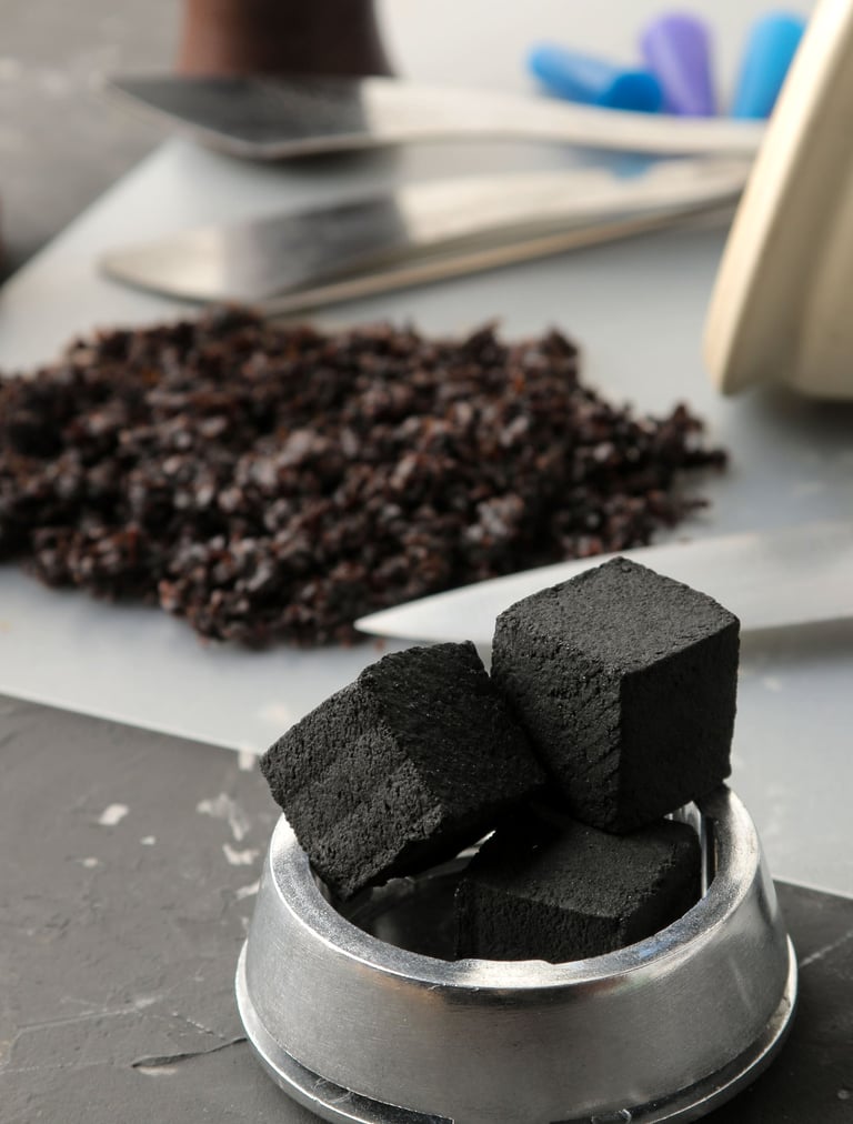 Cubes coconut shell charcoal ready to burn