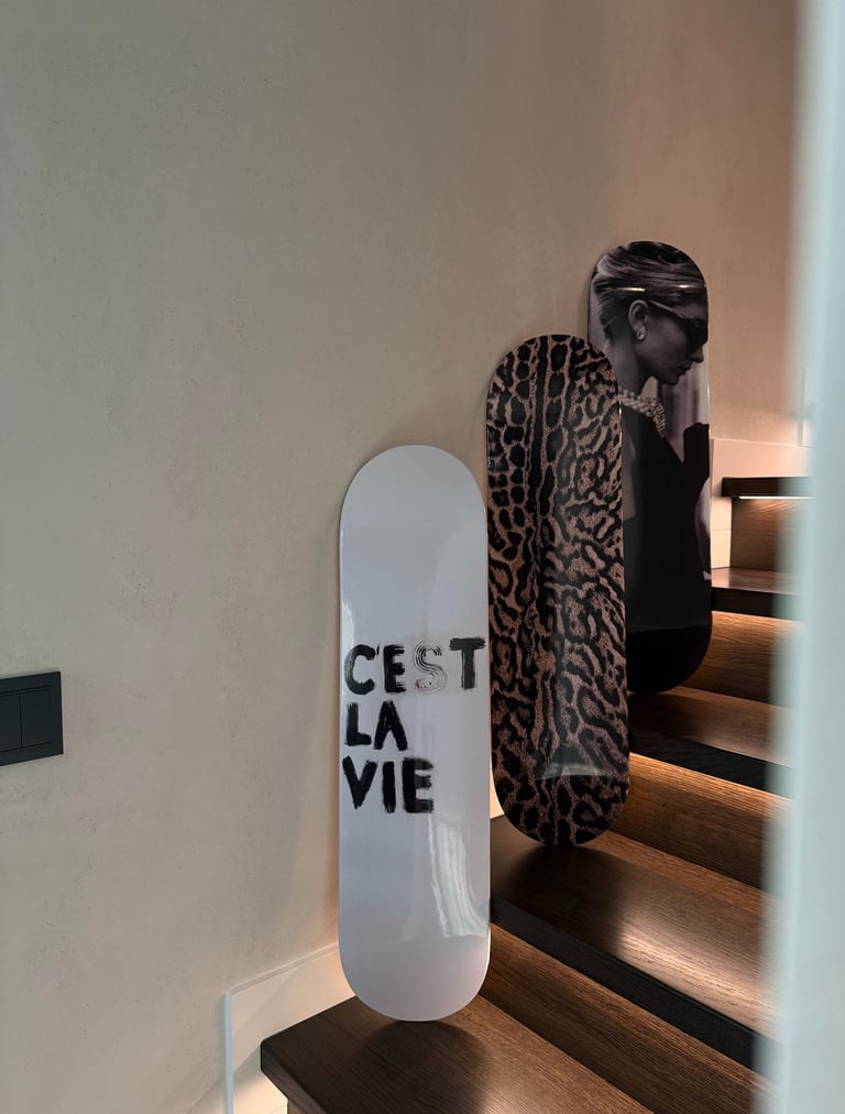 3 piece wall art set on stair lit by stair ambient light