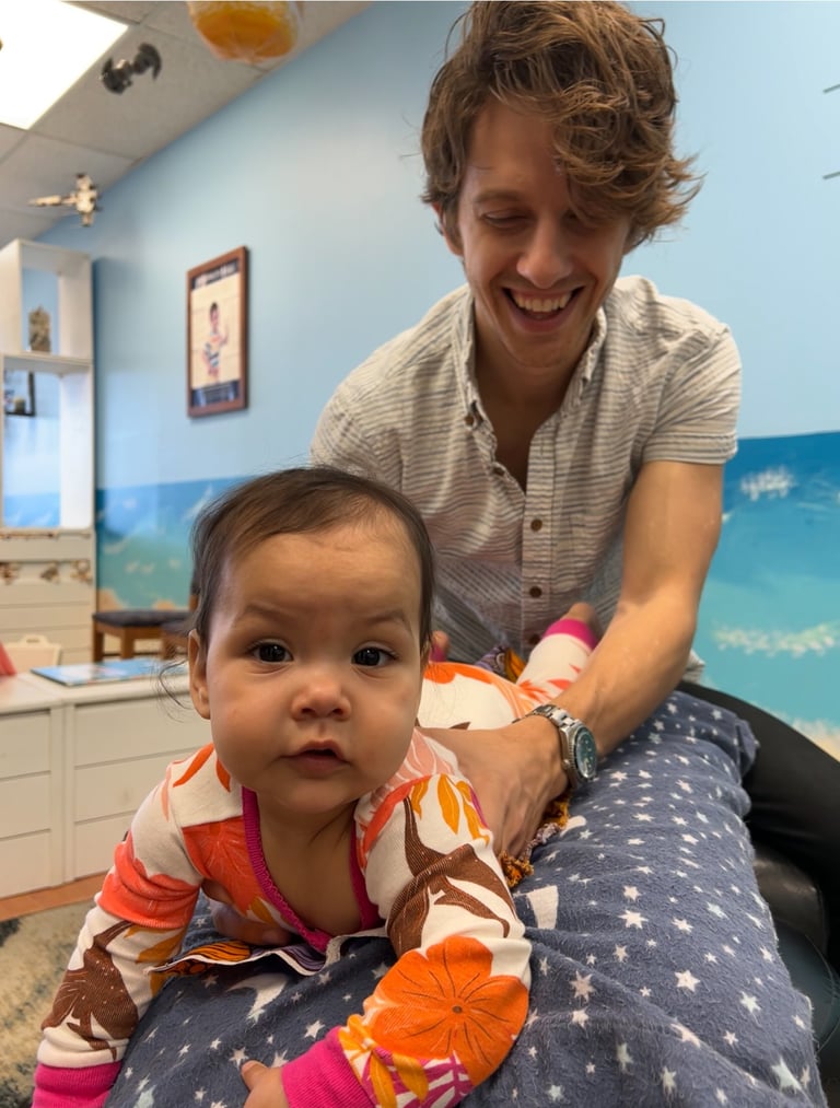 Franklin chiropractor adjusting baby for tongue tie, natural relief