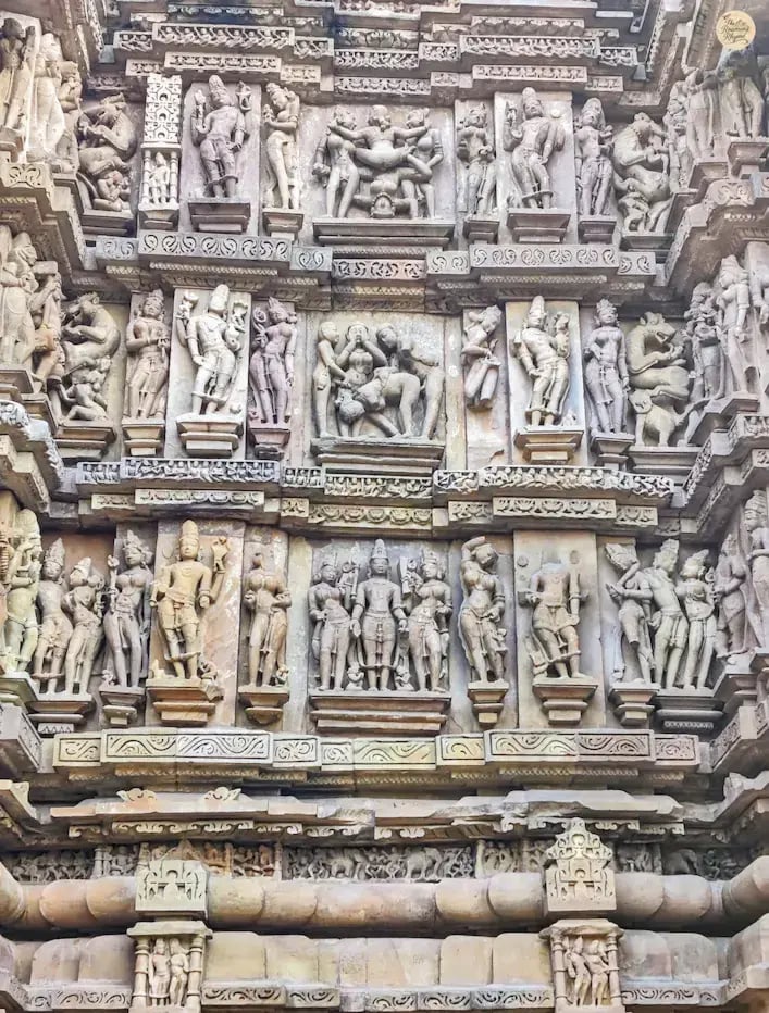 Erotic sculptures on the outer wall of Vishvanatha Temple Khajuraho Mdhya Pradesh.