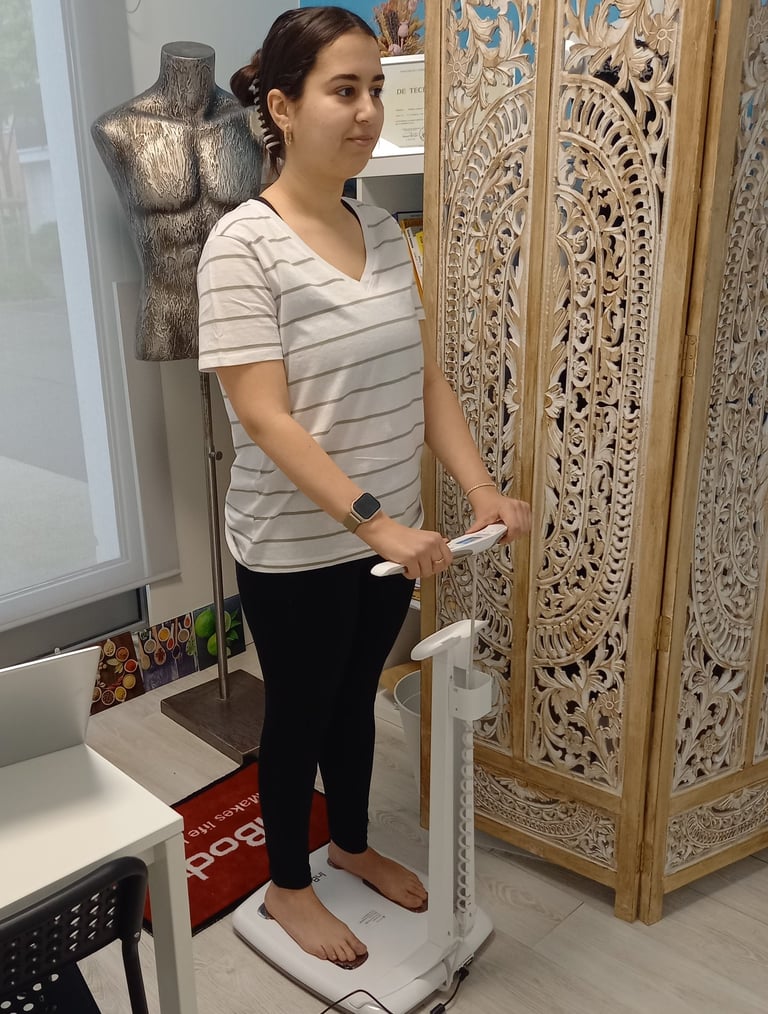 a woman standing on a scale scale with a scale scale