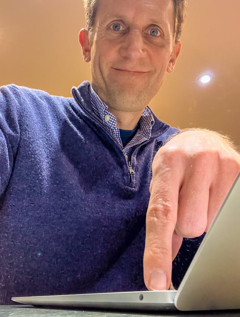 Marcus pressing off button on computer