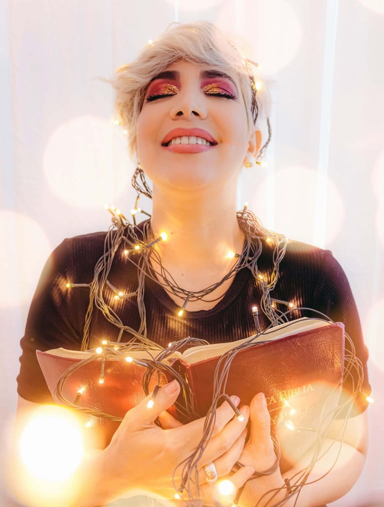 a woman with blonde hair and a book