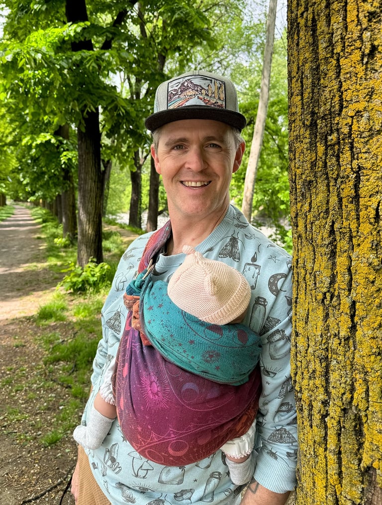 Image of Adam Lofbomm and baby