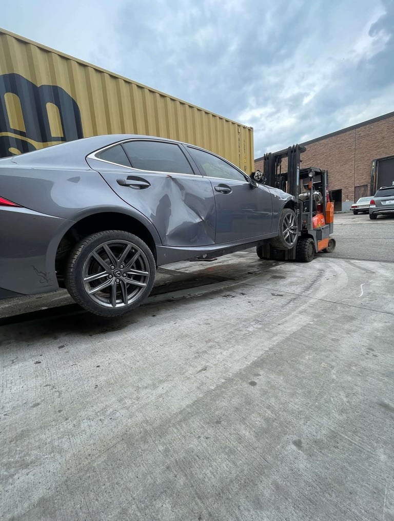 Custom steel fabricated fork lift fork extensions in use